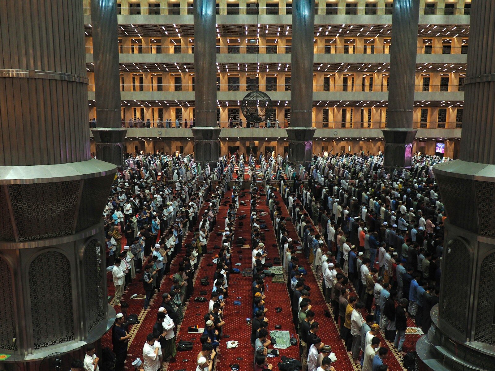 Muslims praying together in a mosque.